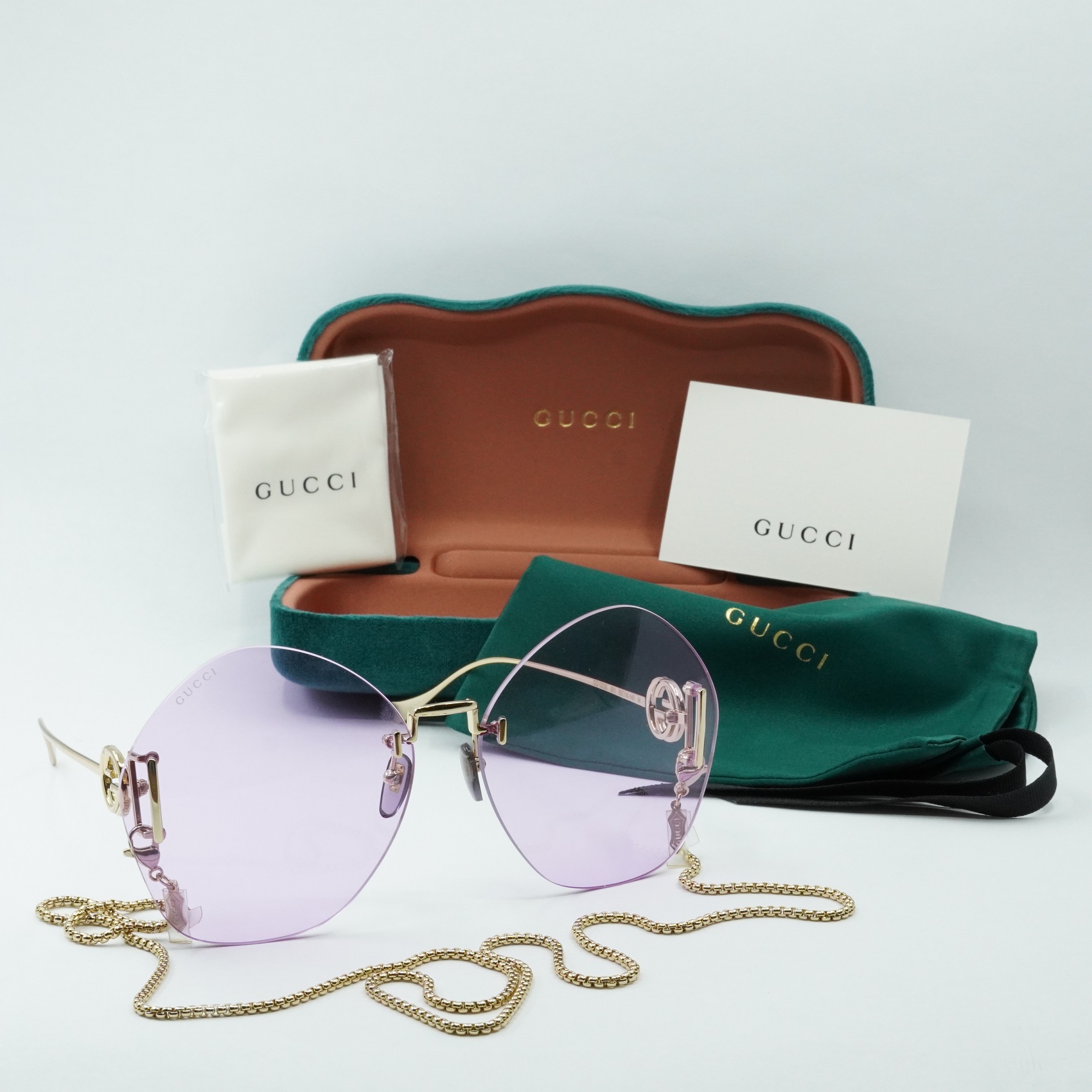 NEW GUCCI SUNGLASSES GUCCI GG1203S 001 GOLD WITH  GOLD CHAIN/VIOLET EYEWEAR s-l1200.jpg main image 3