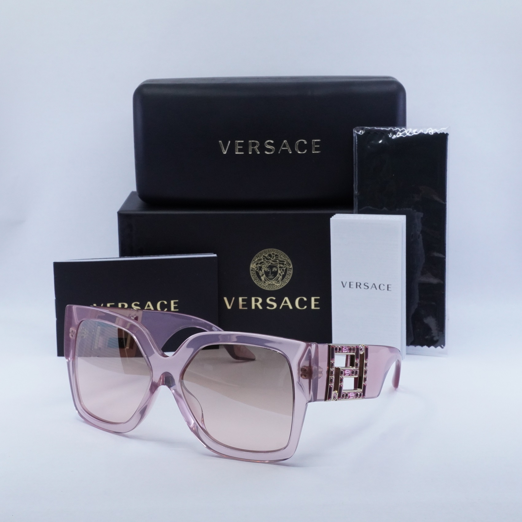 VERSACE ロコフリントノスリフトレス 76HAO94PES096L54 401 Versace Women's Medusa Logo Gold & White Leather Sneakers